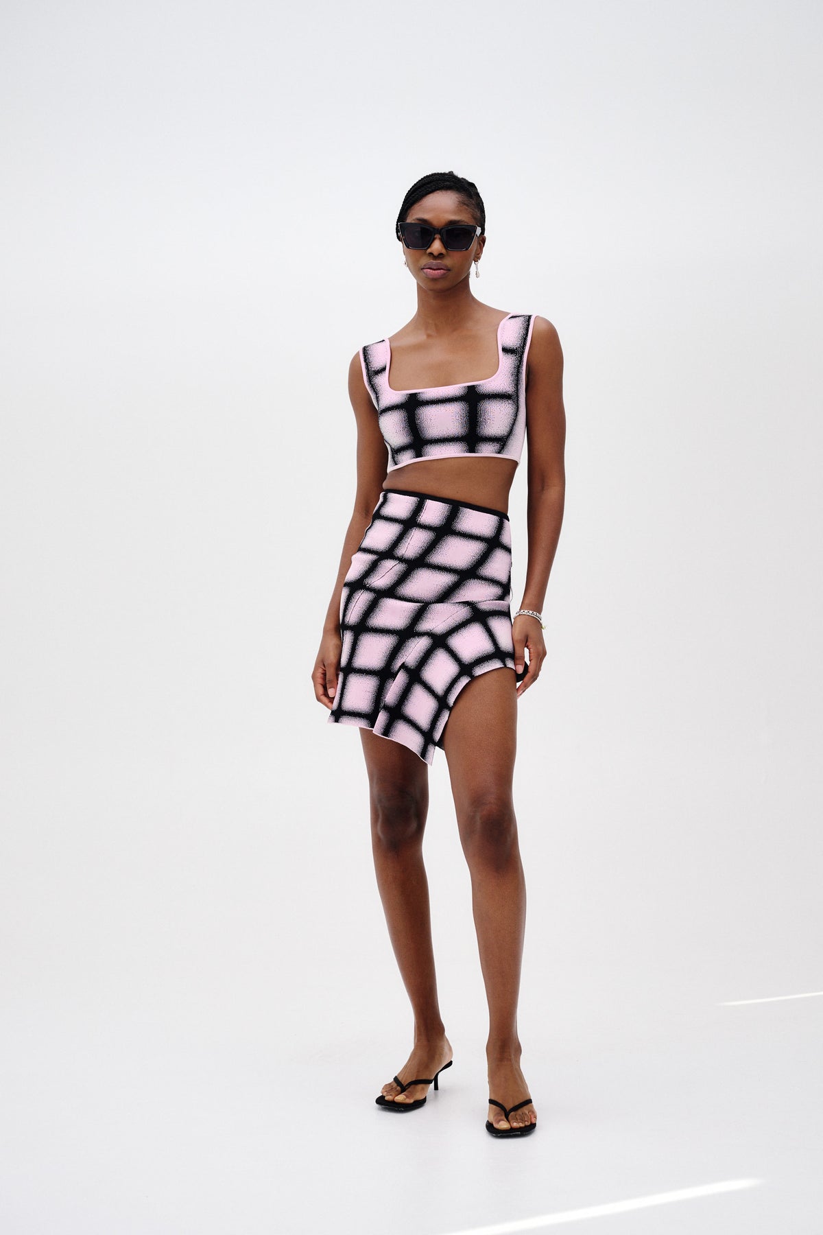 LIZZO UV REACTIVE MINI PLAID SKIRT– PH5